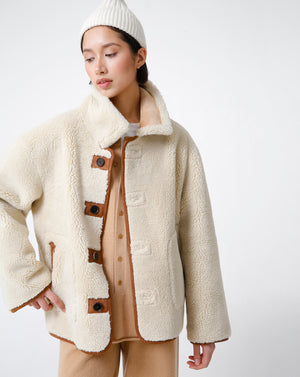 Reversible sheepskin coat by Dunst