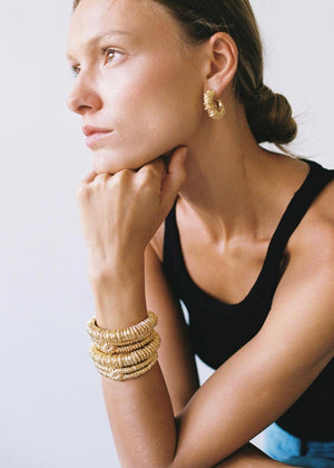 Amulet earrings by Paola Sighinolfi