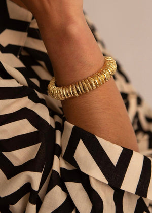 Capital bracelet by Paola Sighinolfi