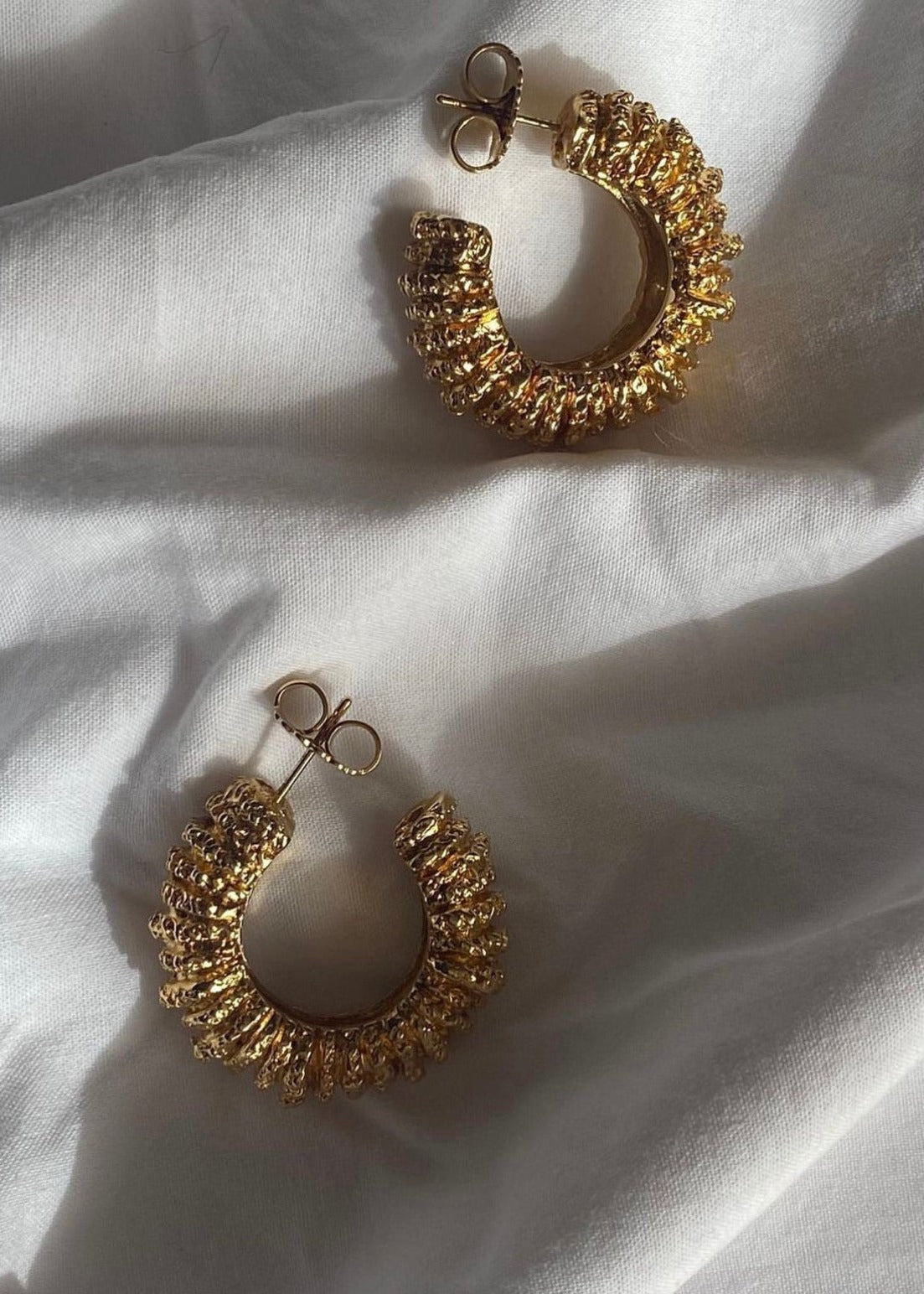 Amulet earrings by Paola Sighinolfi