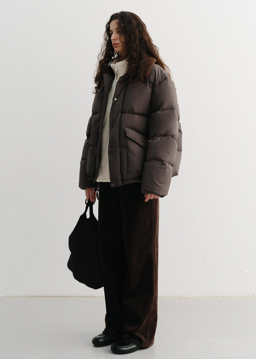 Пухова куртка від Dunst