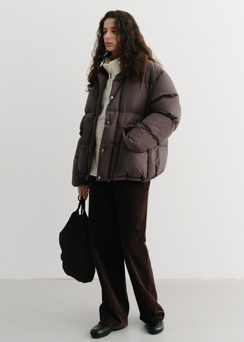 Пухова куртка від Dunst