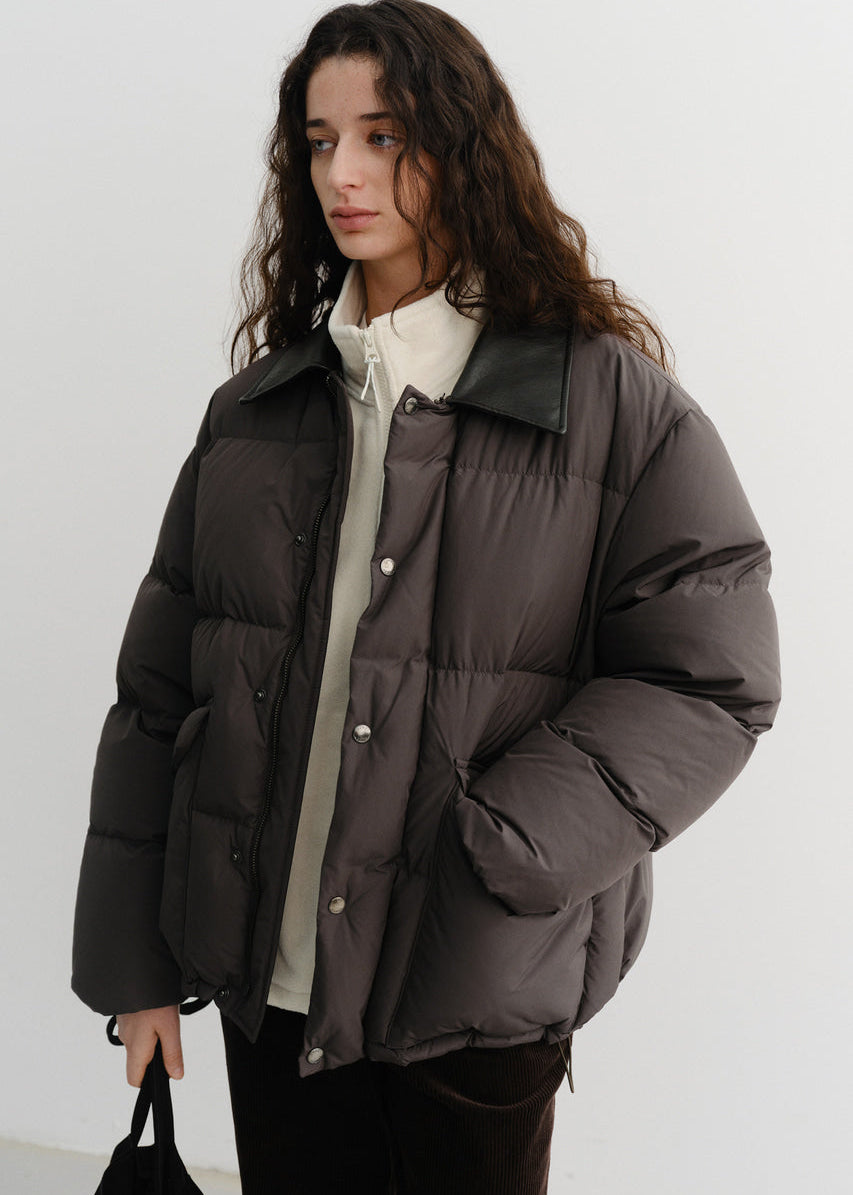 Пухова куртка від Dunst