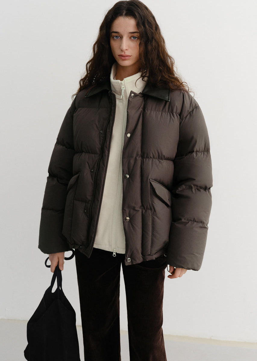 Пухова куртка від Dunst