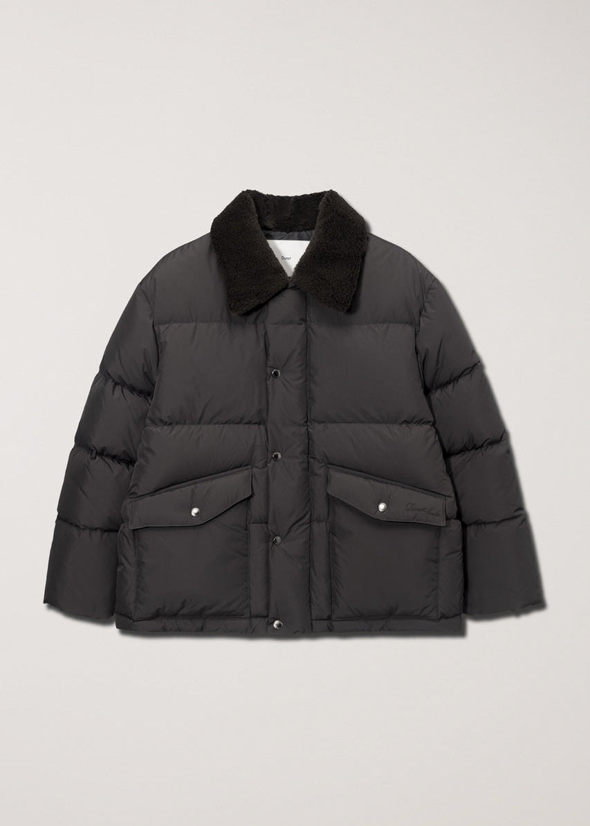 Пухова куртка від Dunst