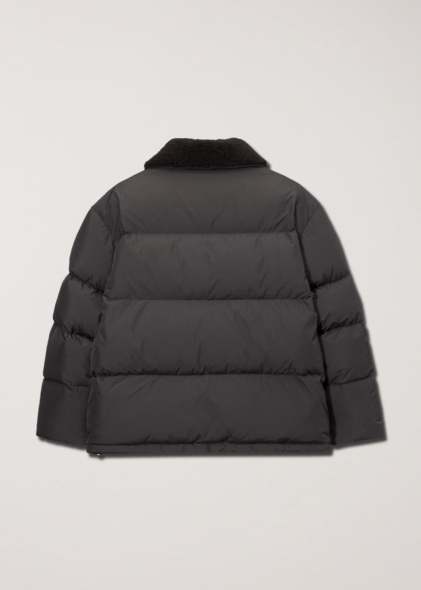 Пухова куртка від Dunst