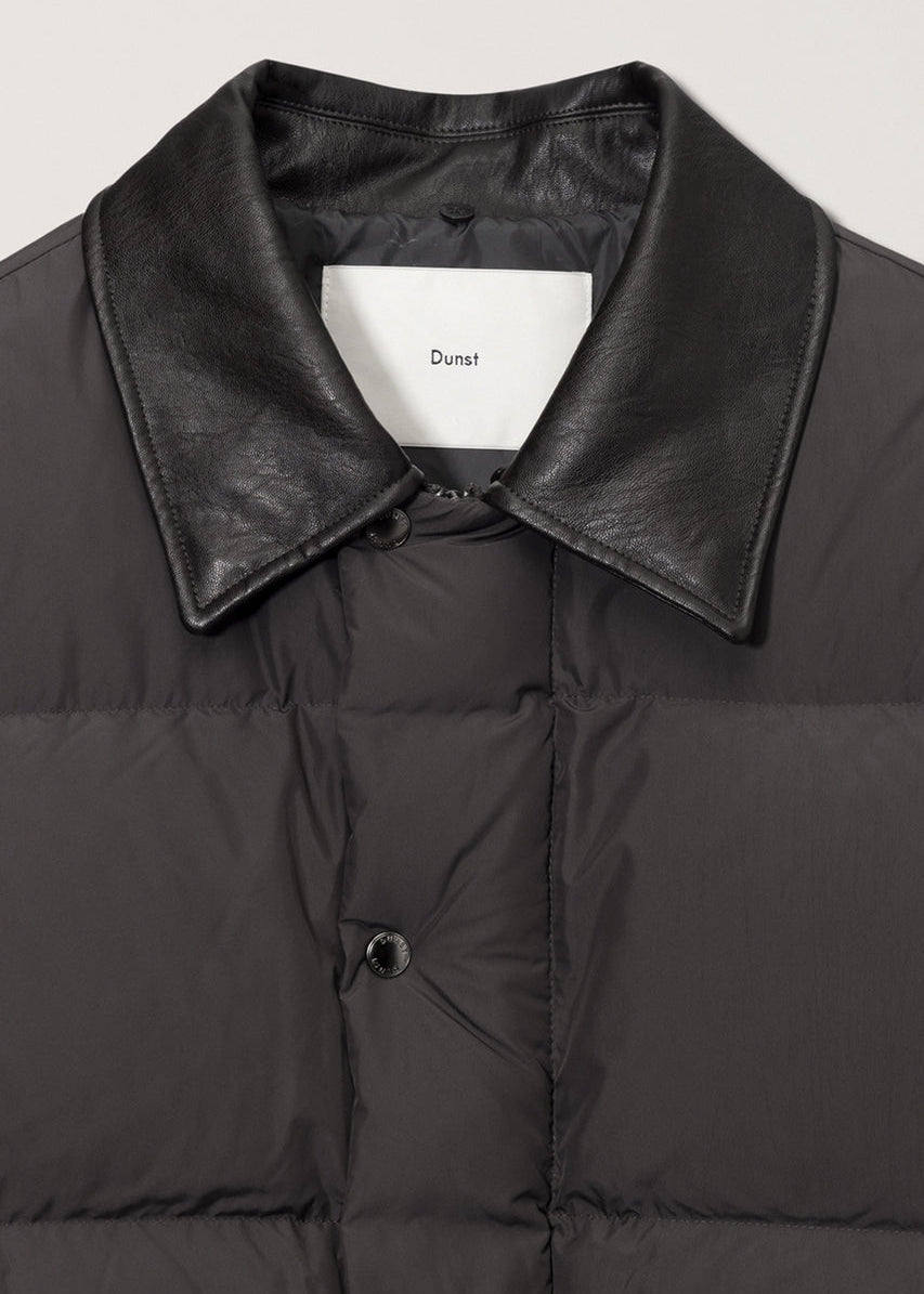 Пухова куртка від Dunst