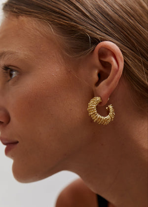 Amulet earrings by Paola Sighinolfi