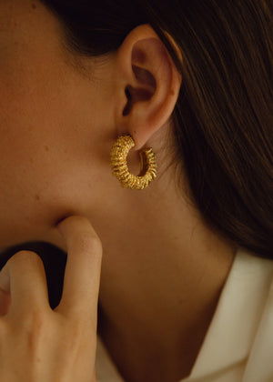 Amulet earrings by Paola Sighinolfi