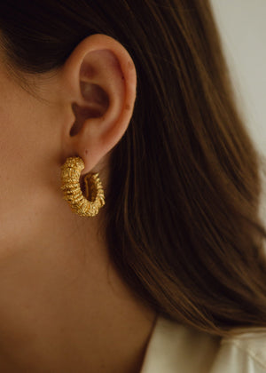 Amulet earrings by Paola Sighinolfi