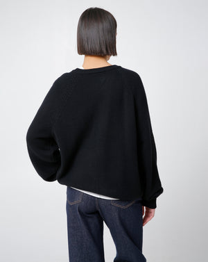 Вовняний светр від Dunst