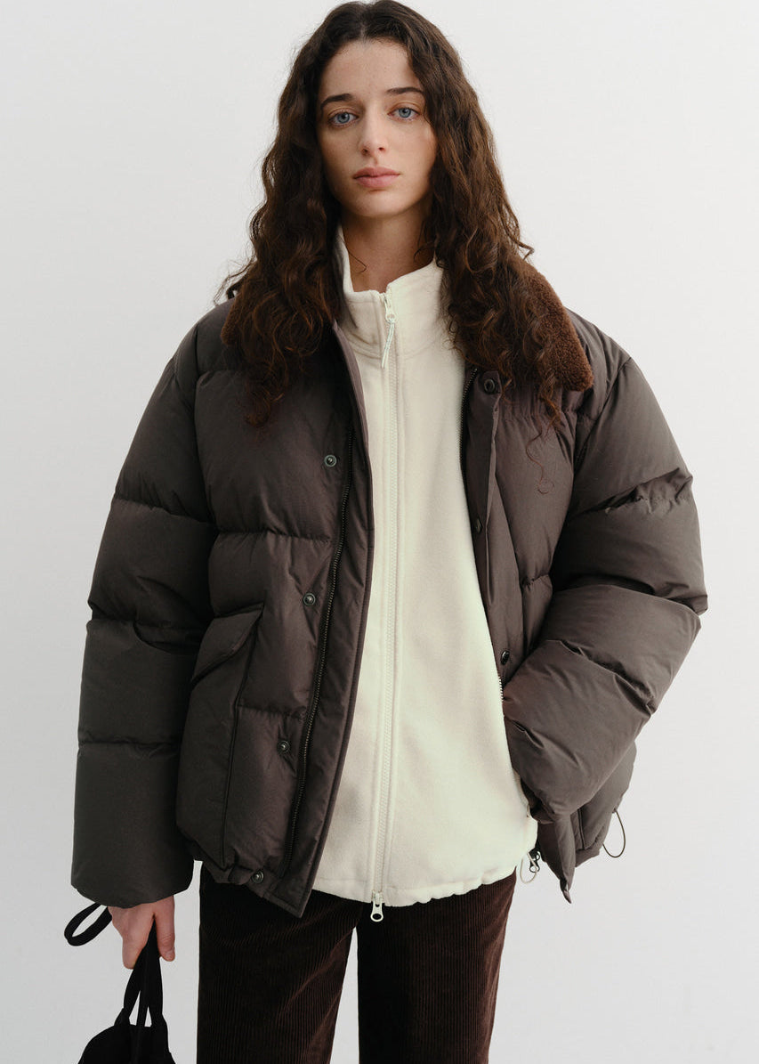 Пухова куртка від Dunst