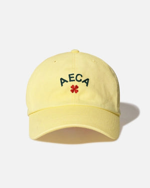 Жовта кепка від AECA